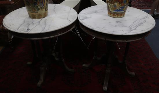 A pair of circular marble top tables, W.76cm